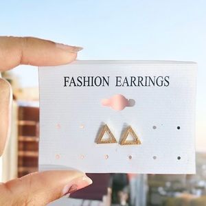 Gold stud earrings